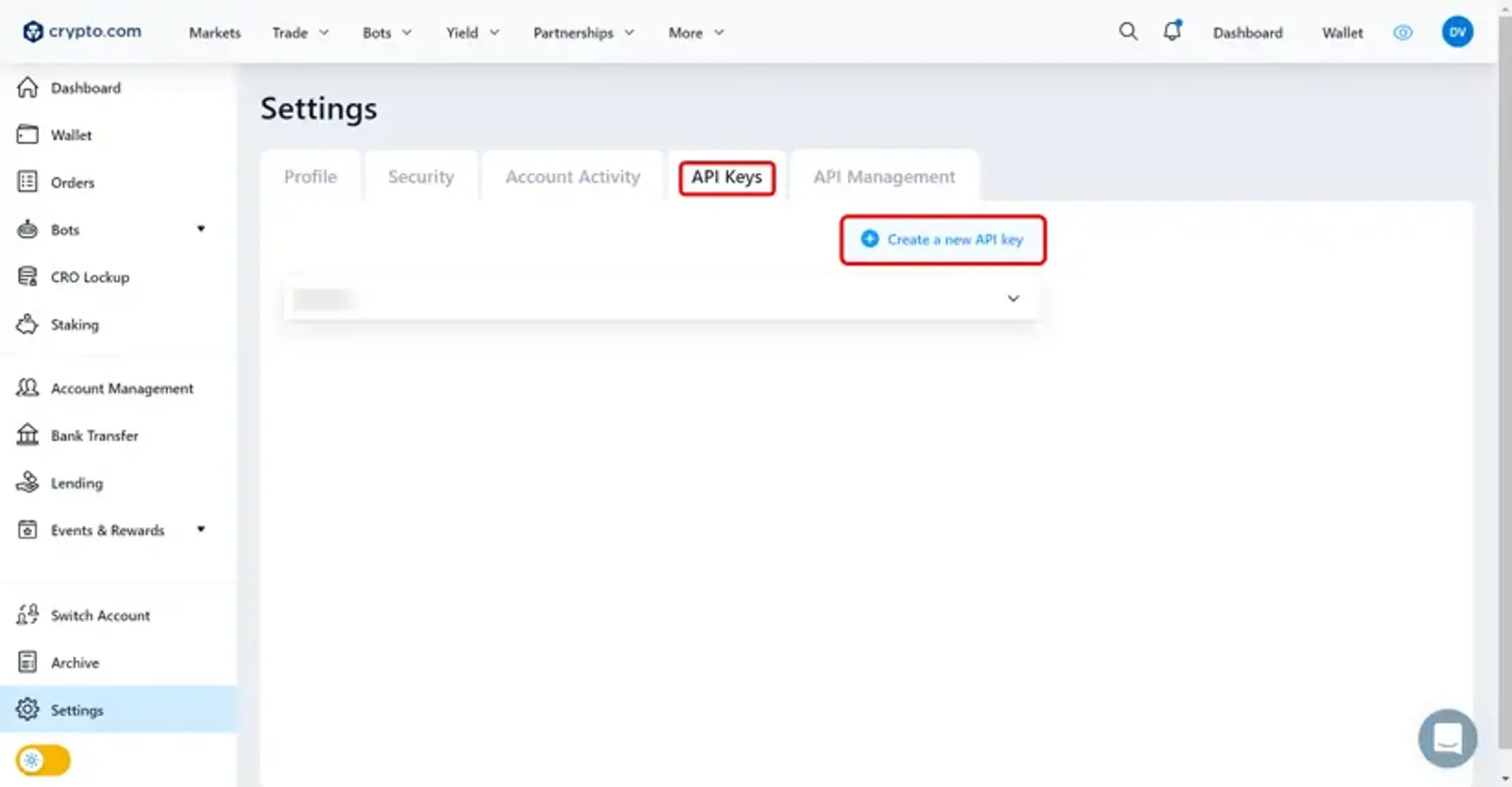 Screenshot van Coinbase met een aanwijzing voor api keys en create a new api key